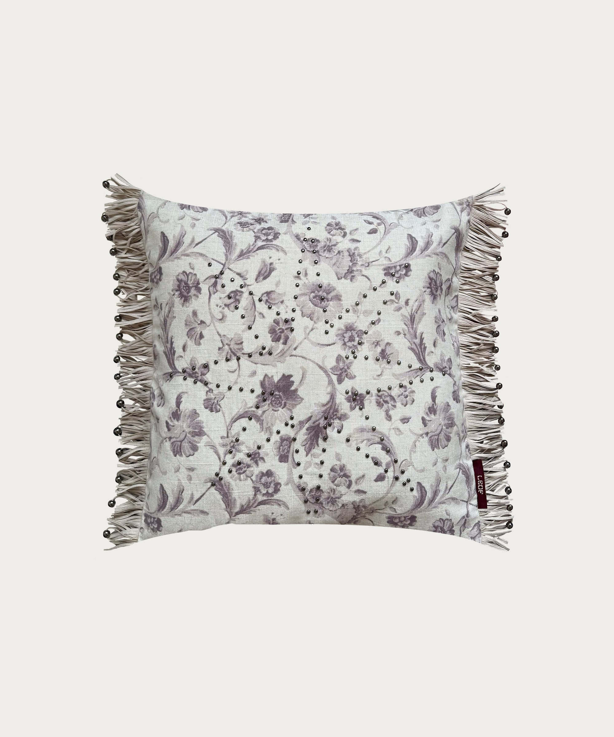 floral square cushion with fringe trim and star stud detail made in england